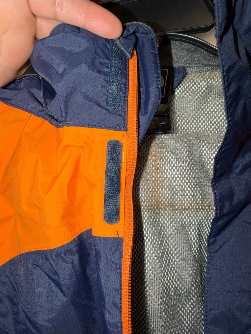 The North Face Kids Navy Blue and Orange Raincoat